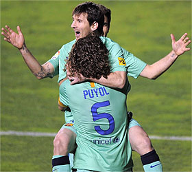 messi puyol